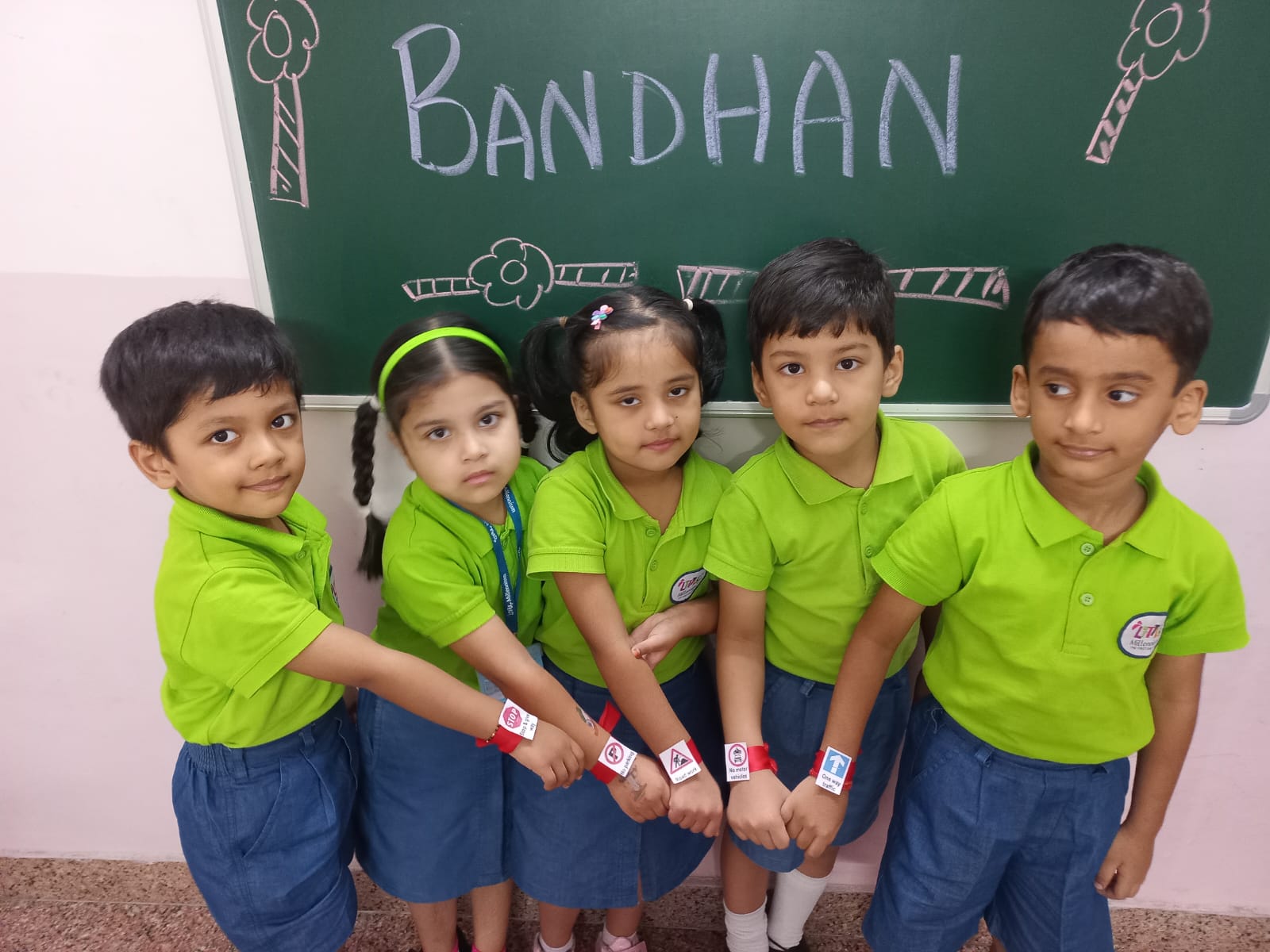 Circle time activity with children seated on colorful mats around their teacher